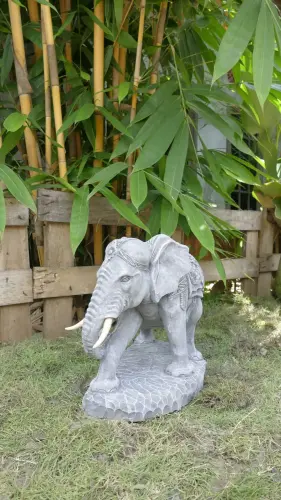 Product image of the product “Nandi - Small Elephant bending to the right, 45cm L | cast stone ”