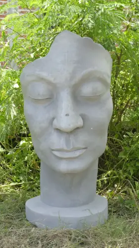 Product image of the product “Aras - Face looking to the right, 120 cm H | cast stone ”