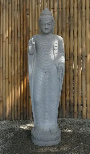 Product image of the product “Standing Indian Buddha - gesture of fearlessness, Regular cape and Pattern cape models, in the sizes from 120cm to 175cm, Natural finish ”