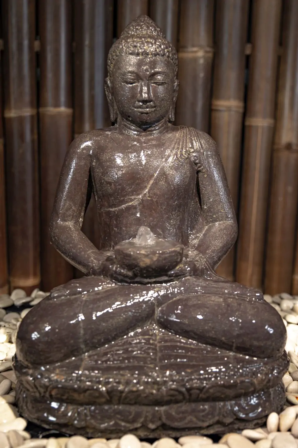  Product image 1 of the product “Seated Buddha with bowl in his hands as water feature 37 x 24 x 51cm. Stone cast, handcrafted & coloured ”