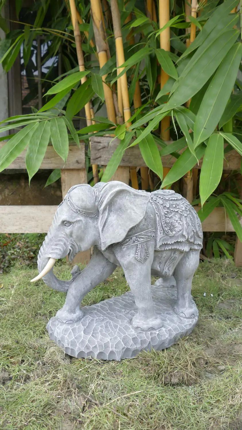  Product image 2 of the product “Nandi - Small Elephant bending to the right, 45cm L | cast stone ”